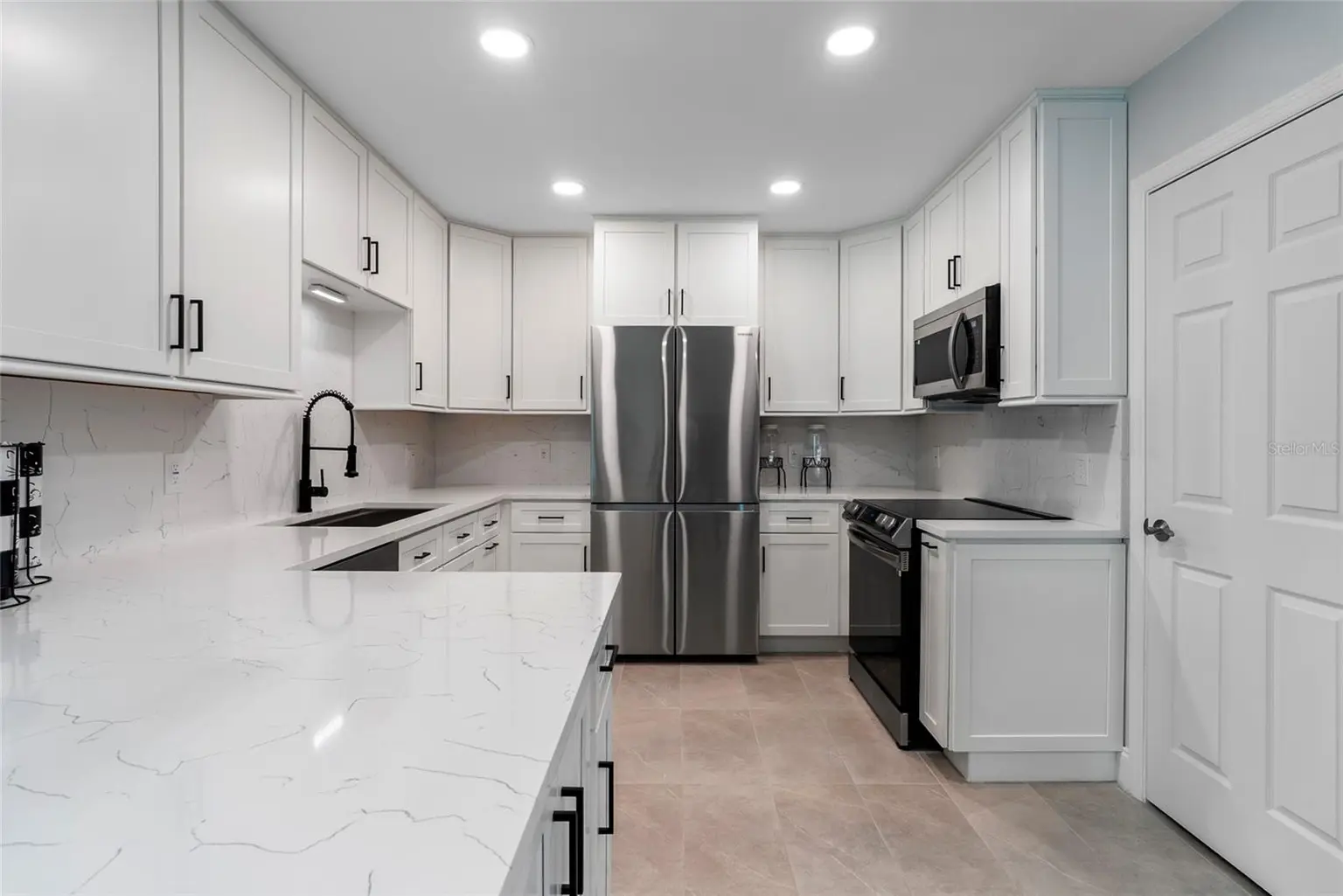 227 HOWARD DRIVE, BELLEAIR BEACH, FL, photo 11 of 56