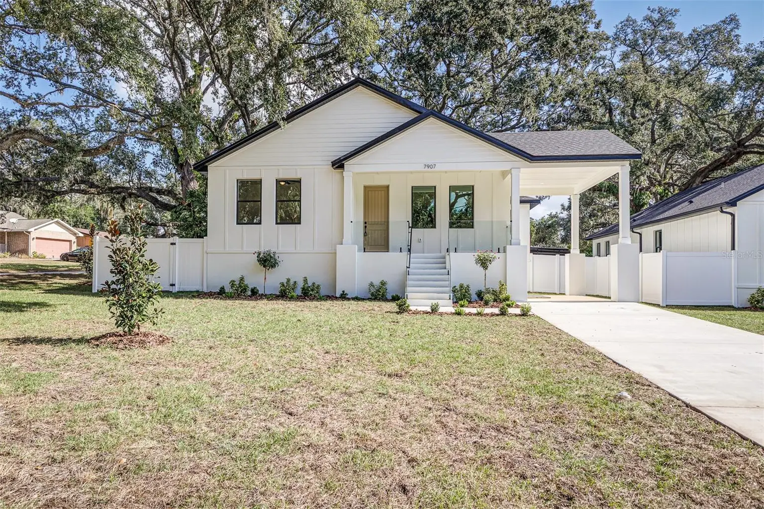 7907 N GREENWOOD AVENUE, TAMPA, FL, photo 4 of 28