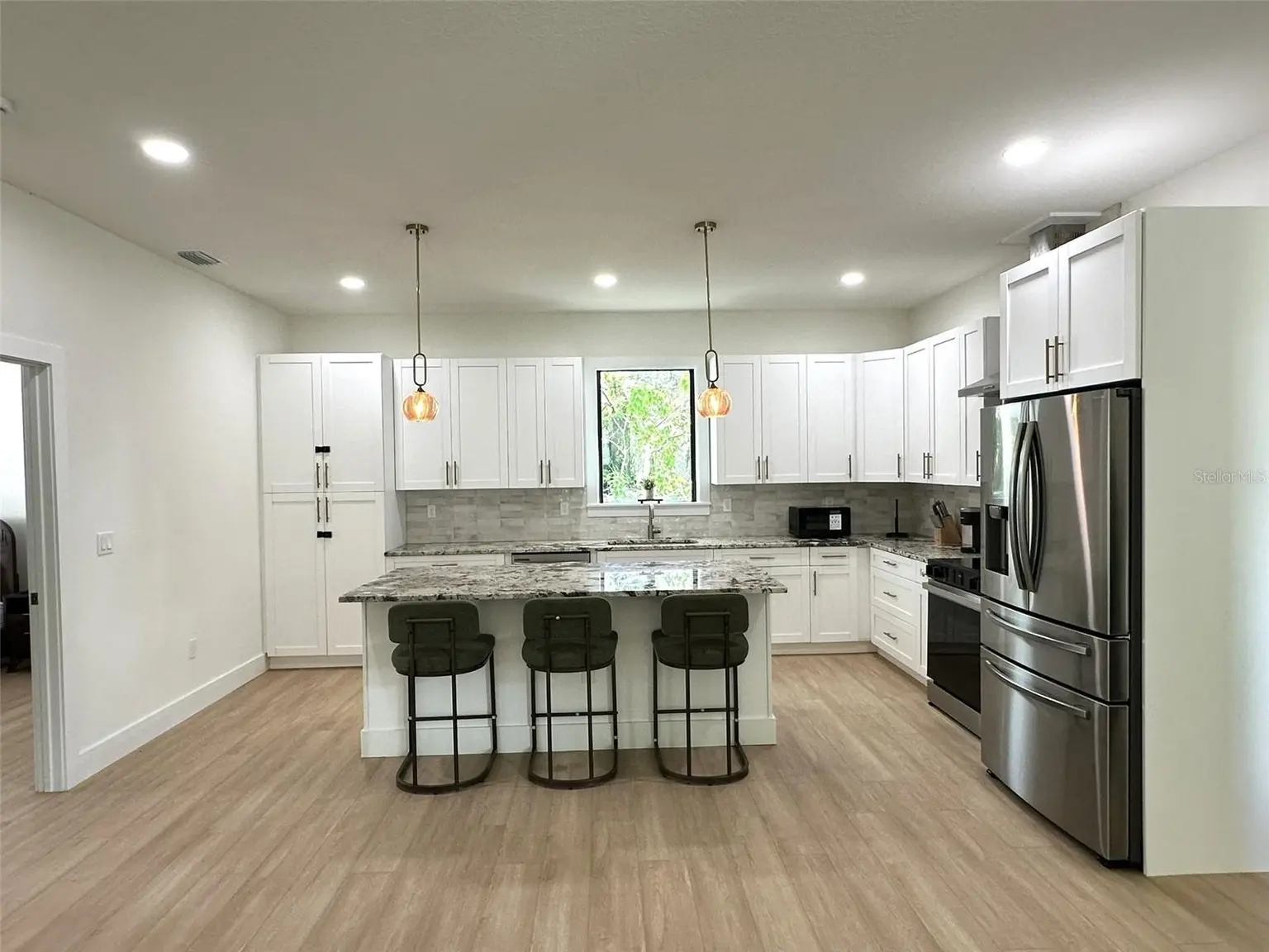 7907 N GREENWOOD AVENUE, TAMPA, FL, photo 9 of 28