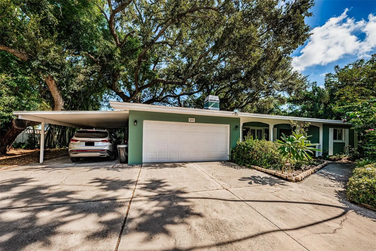 499 JEWEL COURT, BELLEAIR BLUFFS, FL, photo 1 of 20