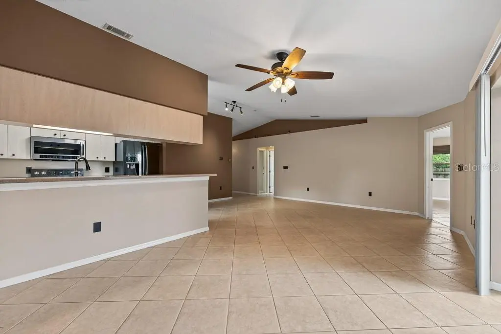 11959 MURRAY AVENUE, SEMINOLE, FL, photo 9 of 58