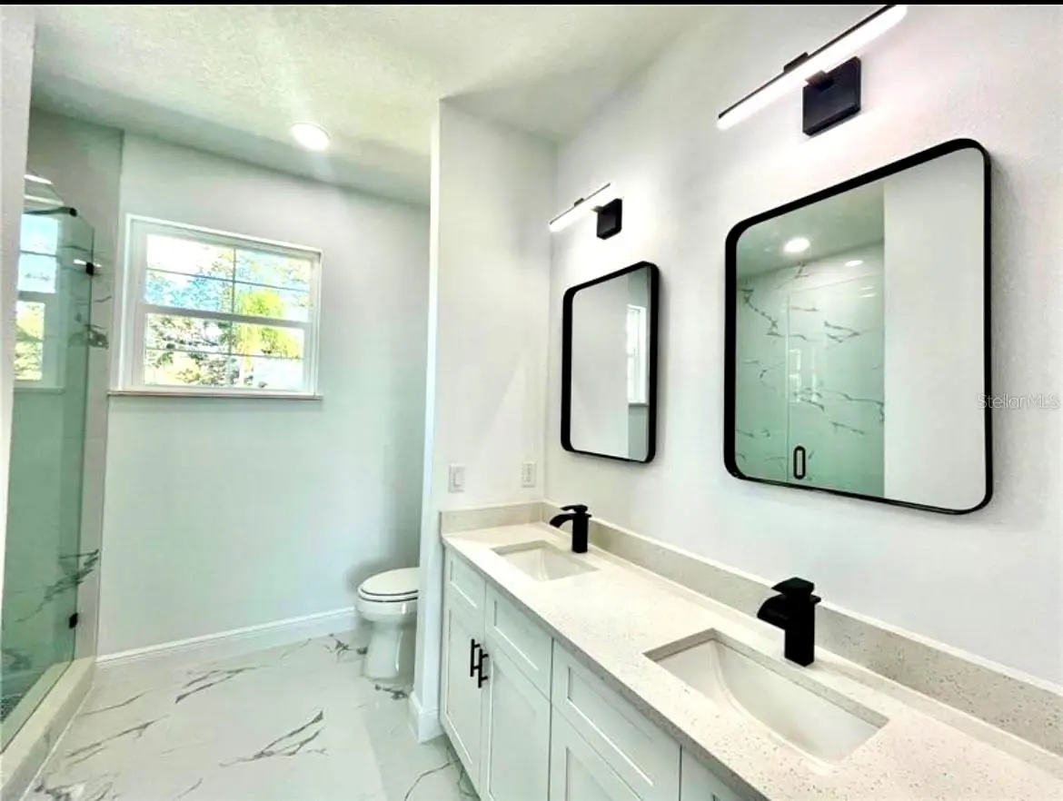 8110 N GREENWOOD AVENUE, TAMPA, FL, photo 10 of 16