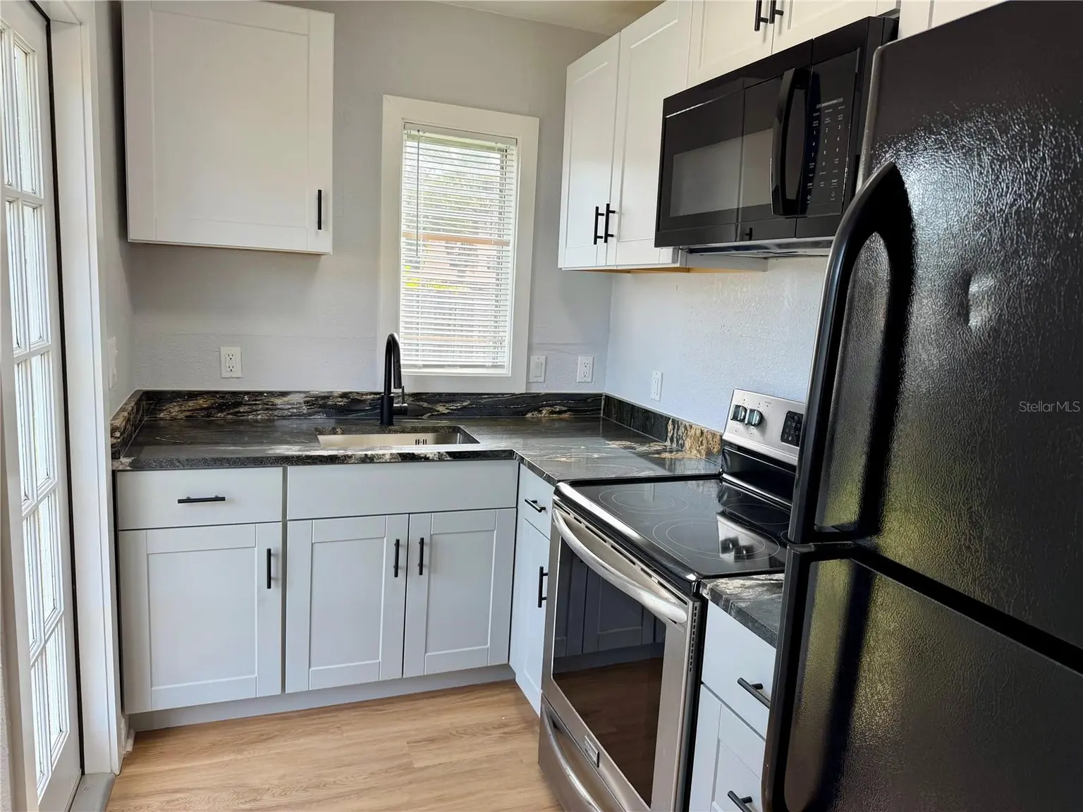 301 80TH AVENUE NE, ST PETERSBURG, FL, photo 4 of 43