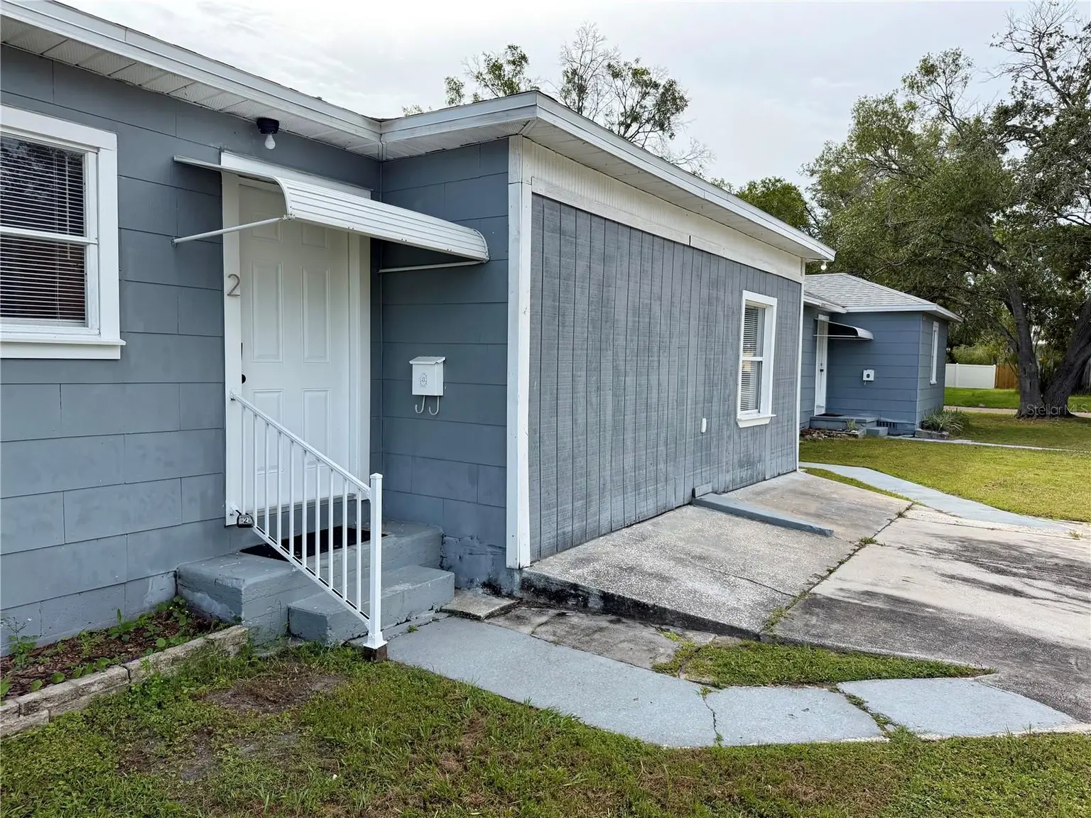 301 80TH AVENUE NE, ST PETERSBURG, FL, photo 2 of 43