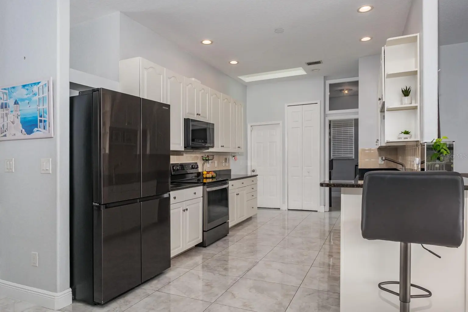 121 7TH STREET, BELLEAIR BEACH, FL, photo 8 of 32