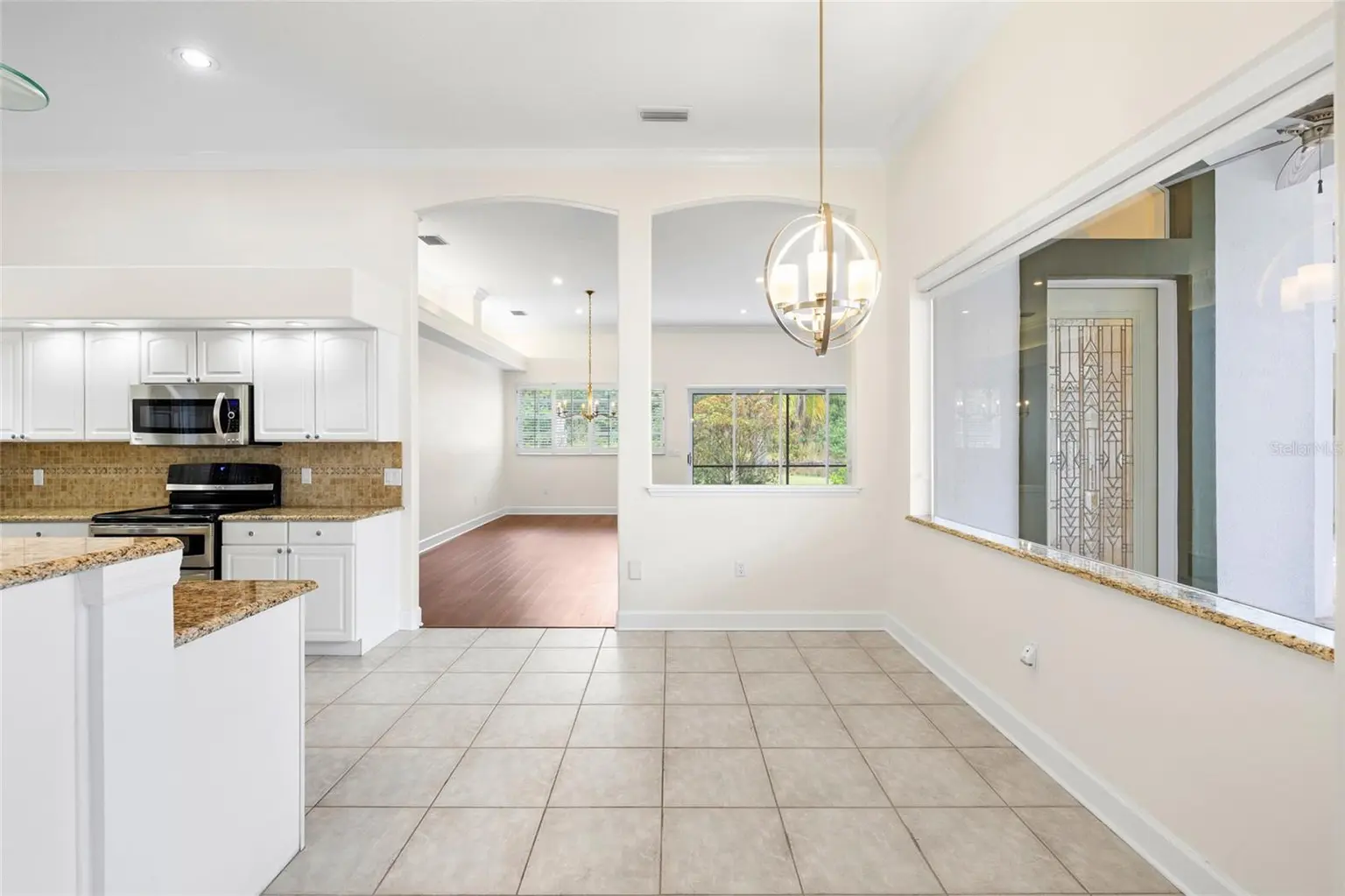 12009 BREWSTER DRIVE, TAMPA, FL, photo 14 of 67