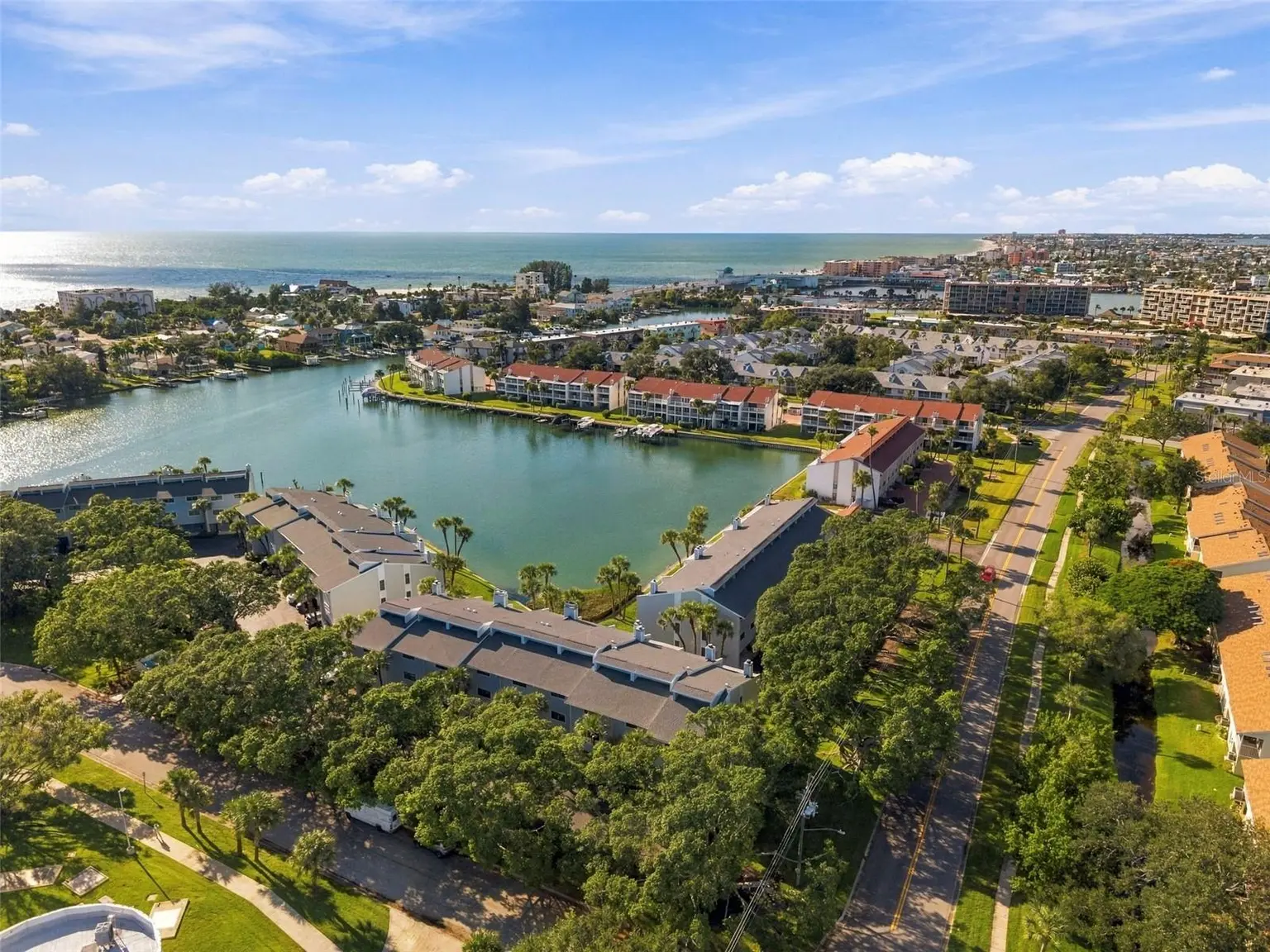12148 CAPRI CIRCLE, TREASURE ISLAND, FL, photo 1 of 61