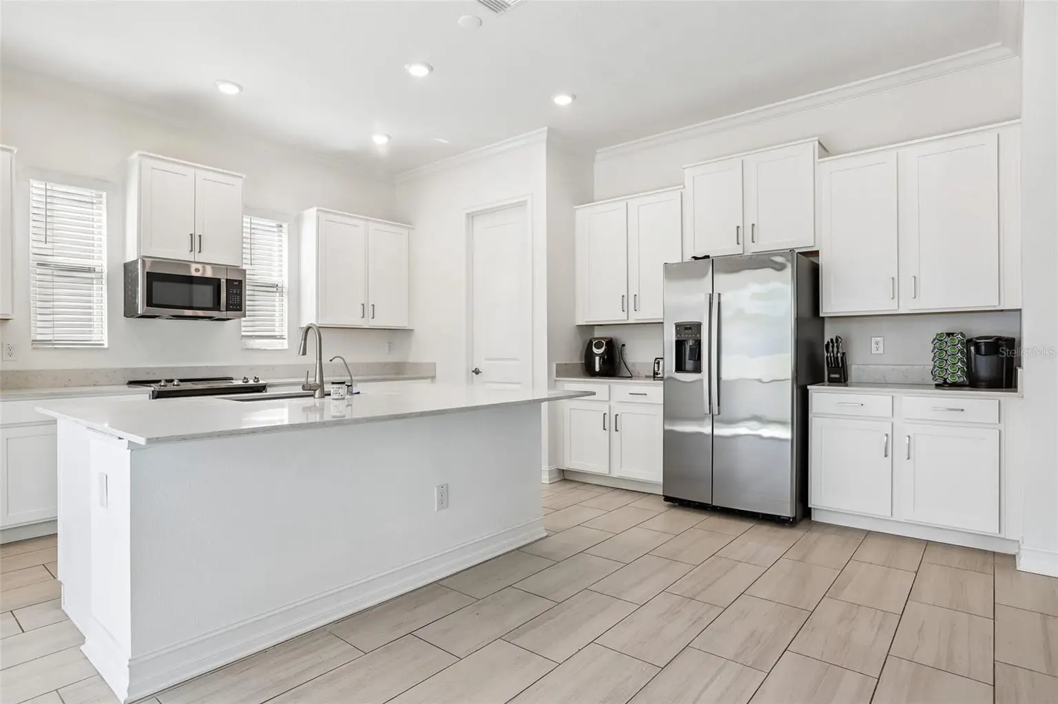 7702 S KISSIMMEE STREET, TAMPA, FL, photo 6 of 36