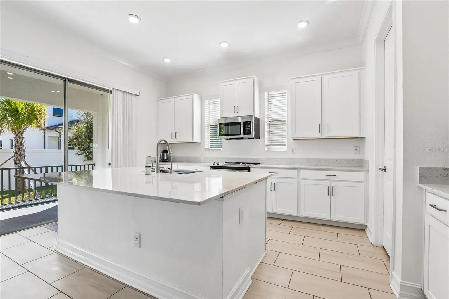 7702 S KISSIMMEE STREET, TAMPA, FL, photo 8 of 36