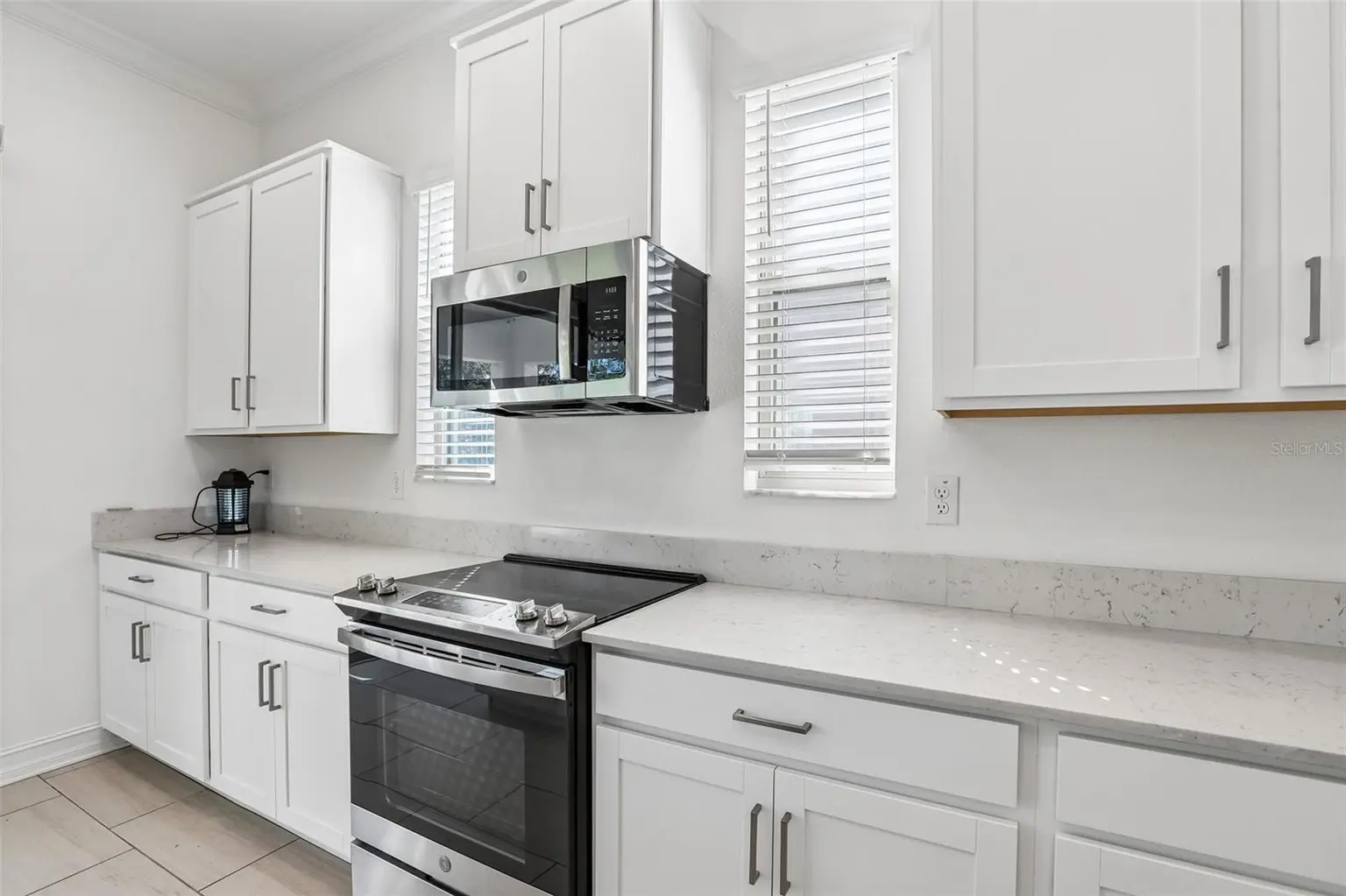 7702 S KISSIMMEE STREET, TAMPA, FL, photo 10 of 36