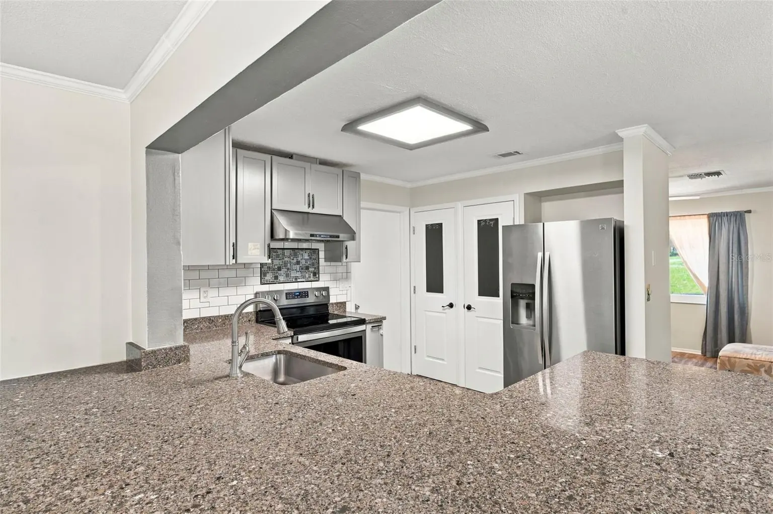 1279 S DISSTON AVENUE, TARPON SPRINGS, FL, photo 13 of 49