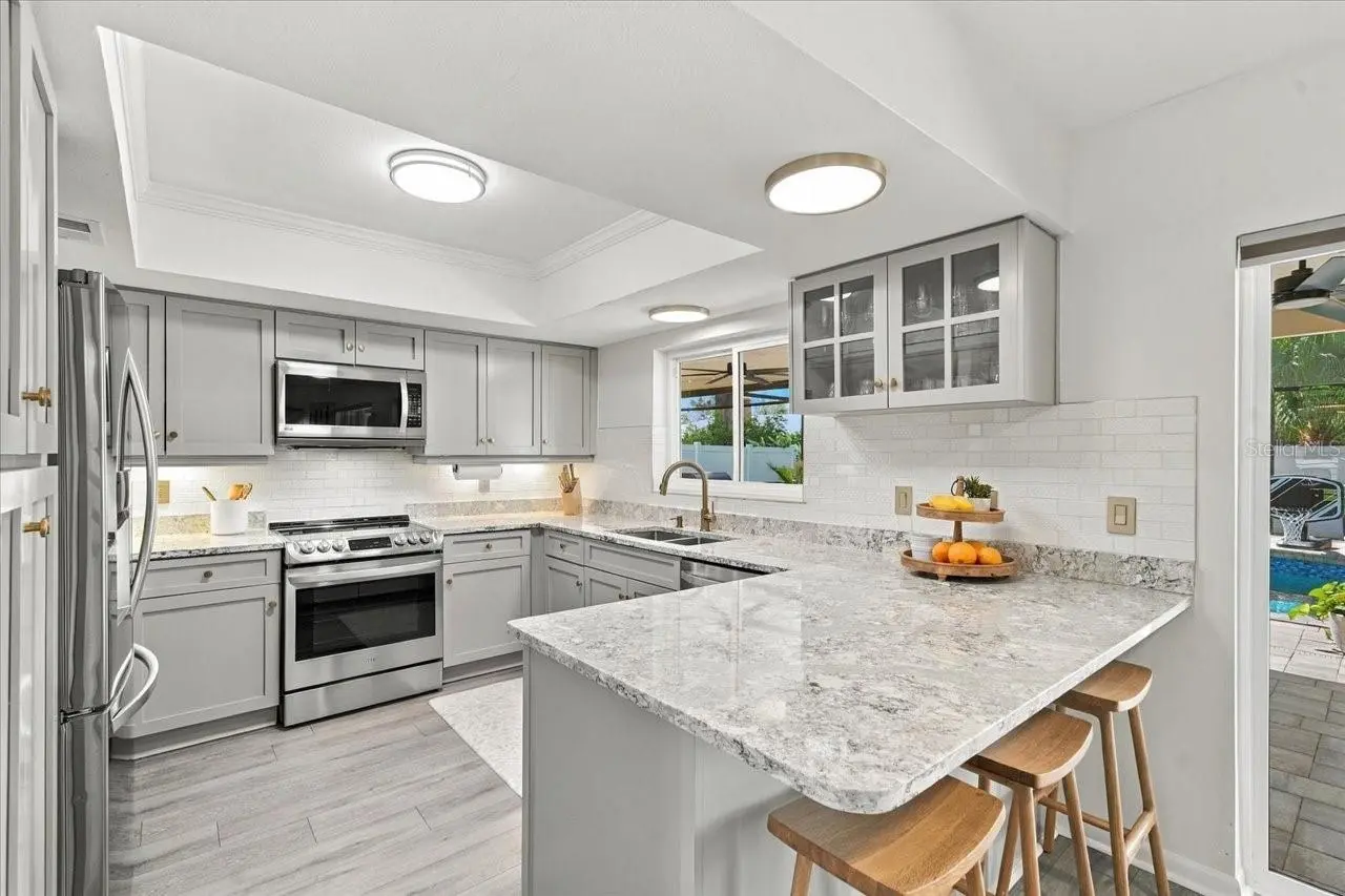 13810 LAKE VILLAGE PLACE, TAMPA, FL, photo 10 of 45