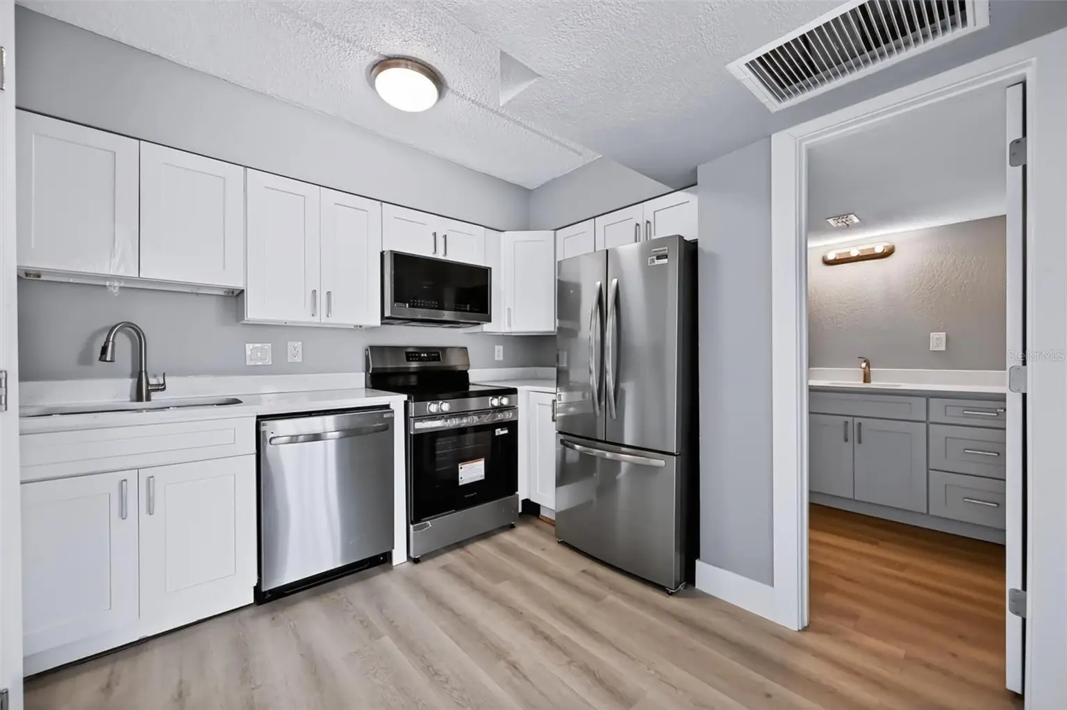 10365 PARADISE BOULEVARD #5, TREASURE ISLAND, FL, photo 5 of 30