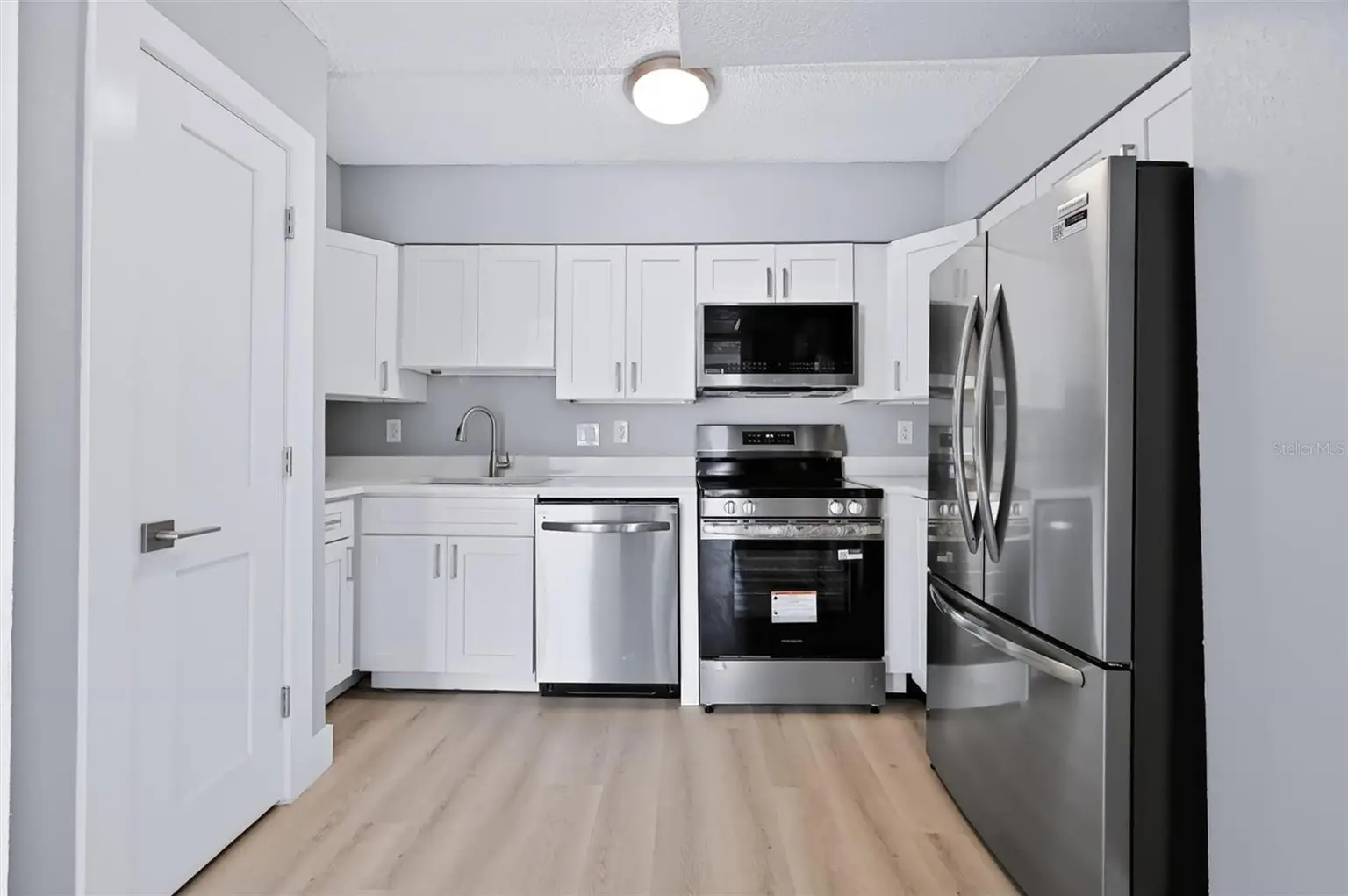 10365 PARADISE BOULEVARD #5, TREASURE ISLAND, FL, photo 6 of 30